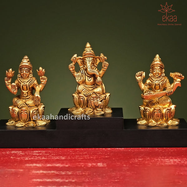 Brass Lord Ganesh Devi Laxmi Devi Saraswati on Wooden Base